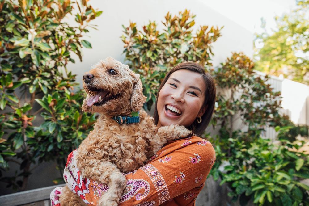 woman with dog | narre warren dentist