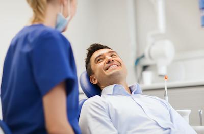 man smiling in dental clinic chair | dentist narre warren south