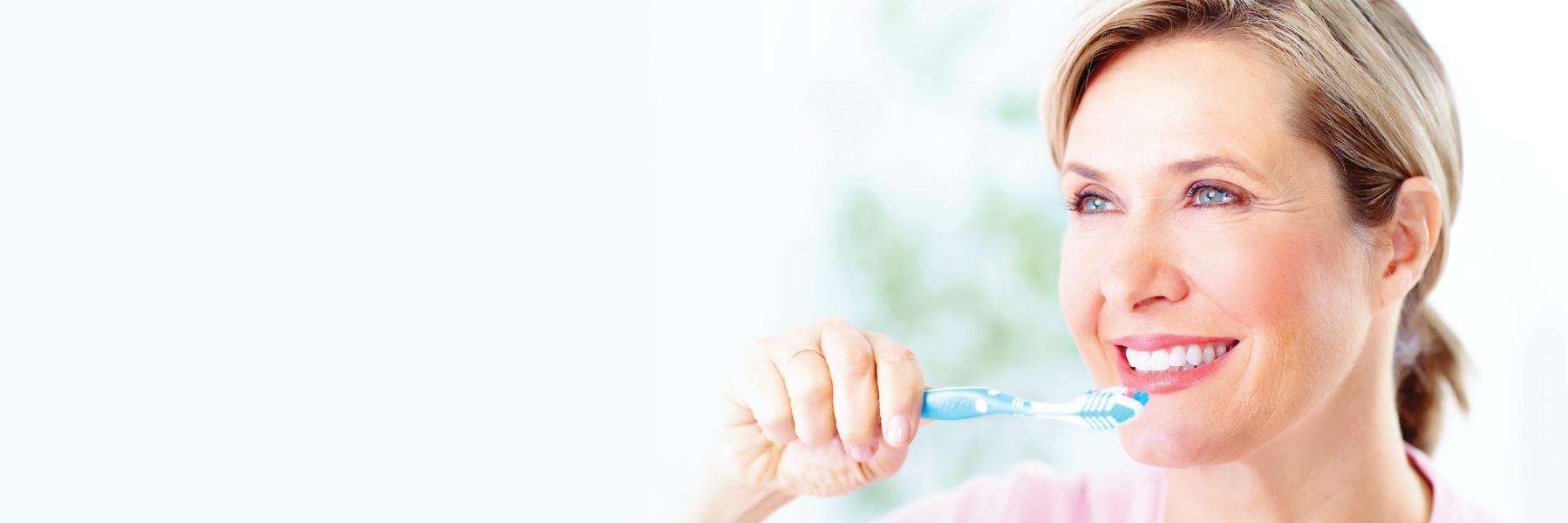 Woman brushing teeth | Narre Warren Dentist