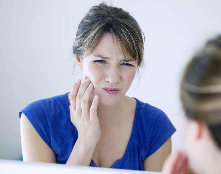 woman with dental pain | Narre warren dentist