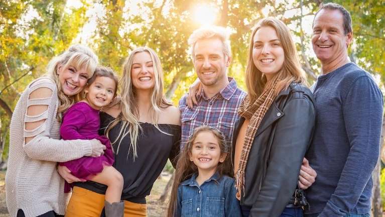 family of eight hugging | dentist near me narre warren south
