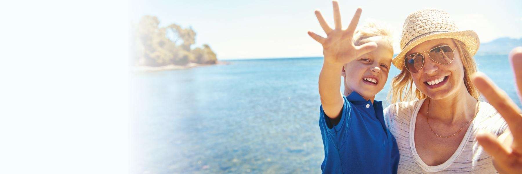 Mother and son on beach | Narre Warren Dentist